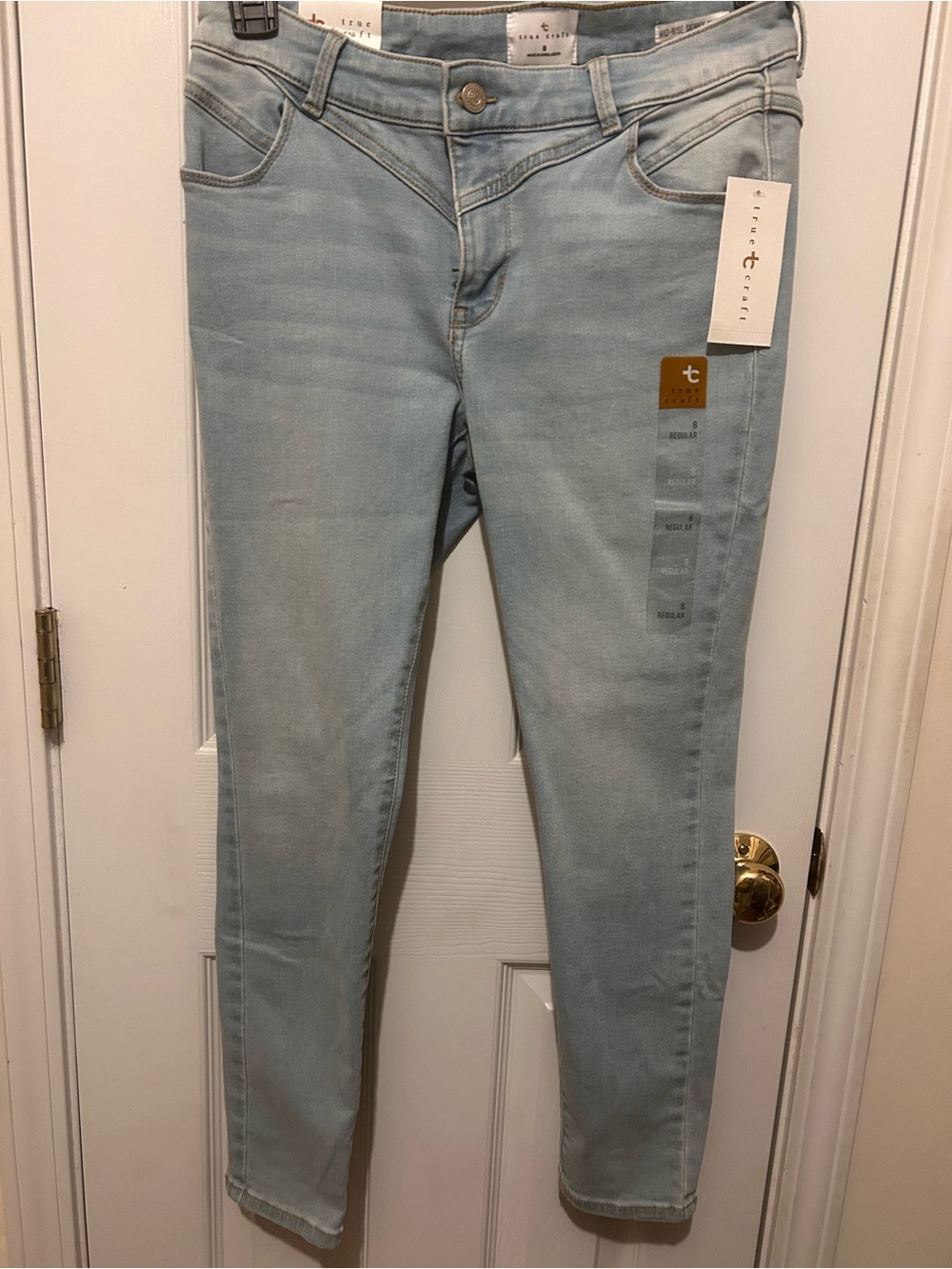Size 8 NWT True Craft light wash, Mid-Rise Skinny Denim Jeans